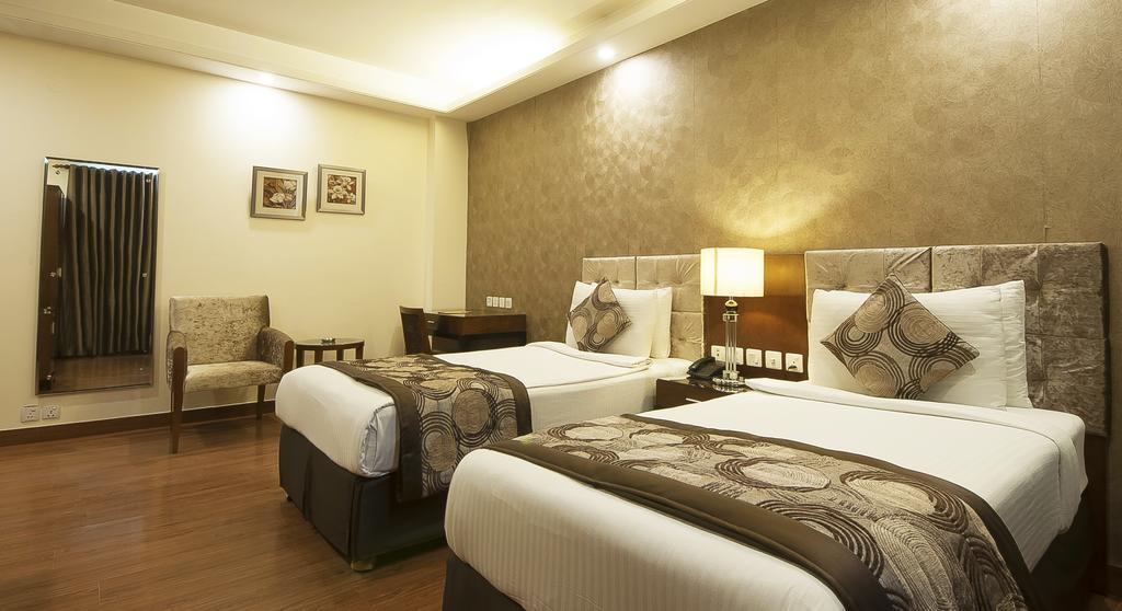 Alpina Hotels & Suites Nueva Delhi Exterior foto